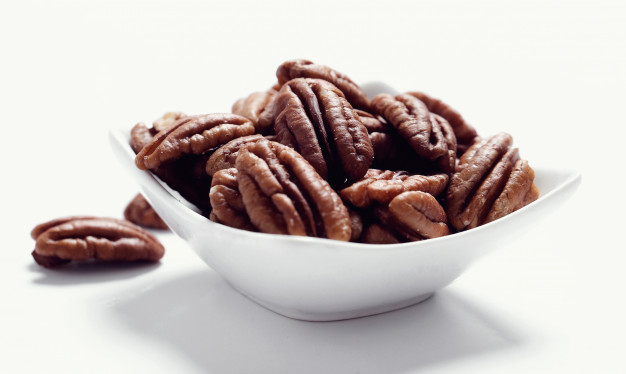 https://www.freepik.com/free-photo/pecans-white-bowl_9185207.htm#page=1&query=pecan&position=1