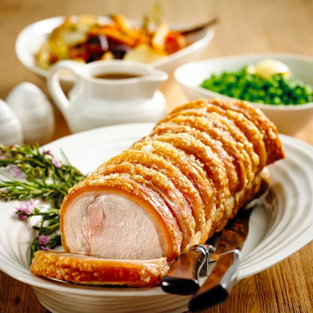 Roasted pork loin with crackling roast vegetables, gravy and apple sauce | Australian Pork